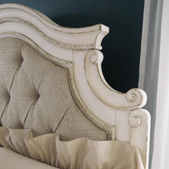 Realyn Upholstered King Panel Bed