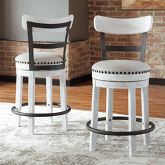 Valebeck White Counter Height Upholstered Swivel Bar Stool by Signature Design by Ashley